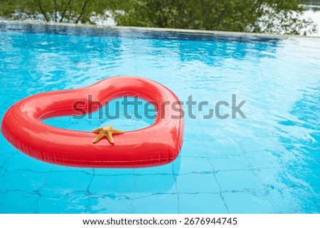 heart shaped float in the pool