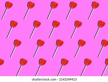 Heart Shaped Lollipops Pattern On Bubblegum Pink Background. Pop Art Lollipop.