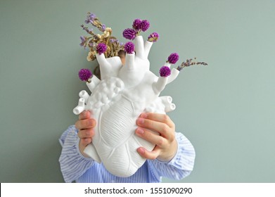 heart-shaped-porcelain-vase-held-260nw-1
