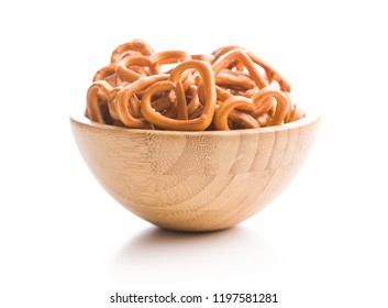 Heart shaped pretzel in bowl isolated on white background. - Powered by Shutterstock