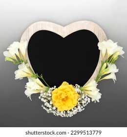 Heart shaped rustic wooden frame with chalkboard and flowers. Suitable for In Memorium card, funeral invitation, mourning, RIP concept. On gradient grey. - Powered by Shutterstock