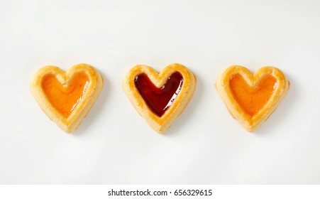 Heart Shaped Shortbread Cookies With Apricot And Cherry Jam Filling