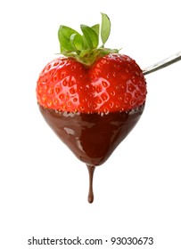 a heart shaped strawberry dipped in chocolate fondue, valentine's day