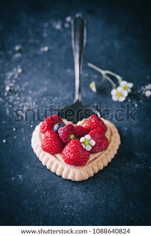 Similar – Strawberry tartlet in heart shape