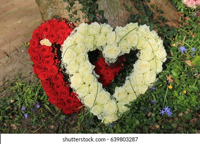 Heart Shaped Sympathy Flowers  Or Funeral Flowers Near A Tree