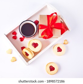 Heart Shaped Traditional Linzer Cookies With Strawberry Jam, Mug Of Coffee And Gift Box. Valentine S Day Concept.