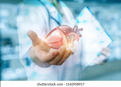 Heart shows a medical worker on blurred background.