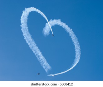 A Heart In The Sky From Skywriting Biplanes