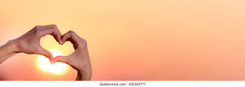 heart in the sunset - Shutterstock ID 432103777