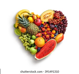 Heart Symbol. Fruits Diet Concept. Food Photography Of Heart Made From Different Fruits Isolated White Background. High Resolution Product