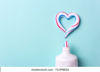 Heart symbol and love from toothpaste. Copy space for text