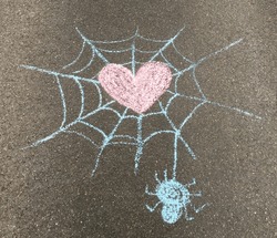 Heart, Web And Spider, Drawing Outside On The Sidewalk. Painting With Colored Chalks. The Child Attracted His Sense Of Affection.