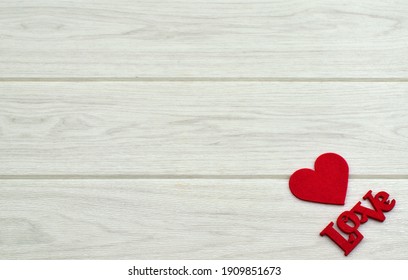 Heart and writing love letters made of red felt