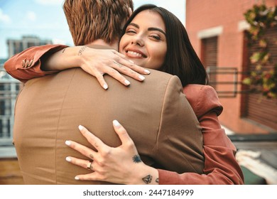 A heartfelt moment captured as a couple embraces each other in a warm hug, showing the depth of their affection and connection - Powered by Shutterstock