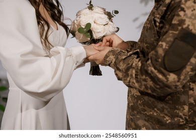 A Heartfelt Wedding Ceremony Celebrating Love and Commitment Between a Bride and a Soldier. - Powered by Shutterstock