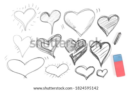 Hearts hatching set and collection, sketching with rubber eraser and graphite stick isolated on white background, top view