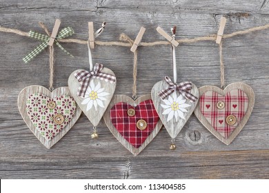 Hearts over a wooden background - Powered by Shutterstock