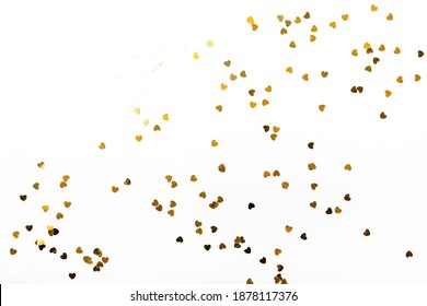 Hearts sequins on a white background, flat lay top view - Powered by Shutterstock