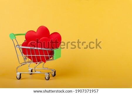 hearts in shopping grocery cart, shopping handcart