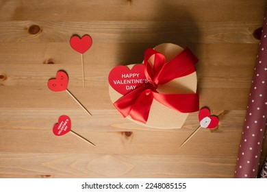 Heart-shaped Box decorated with Red Satin Ribbon, Happy Valentine's Day Card - Shutterstock ID 2248085155