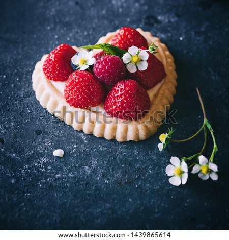 Similar – Strawberry tartlet in heart shape