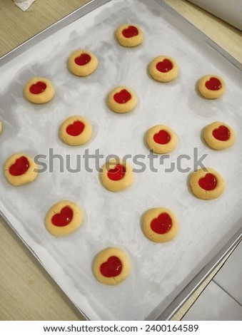 Heart-Shaped Strawberry Jam Thumbprint Cookies 