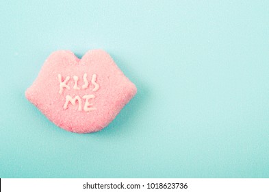 Heart-shaped Valentines candies with "KISS ME" text