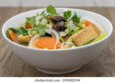 Hearty Bowl Of Tofu Pho For The Vegetarian Appetite Served In A Hearty Bowl.