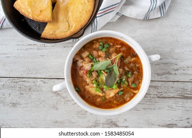 hearty garbanzo black bean and tomato herb soup with cornbread flat lay