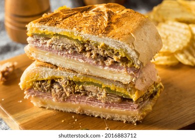 Hearty Homemade Cubano Pork Sandwich with Ham Cheese and Mustard - Shutterstock ID 2016883712
