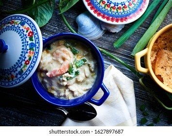 Hearty Shrimp, Crab And Corn Chowder In A Blue Ceramic Crock Bowl.