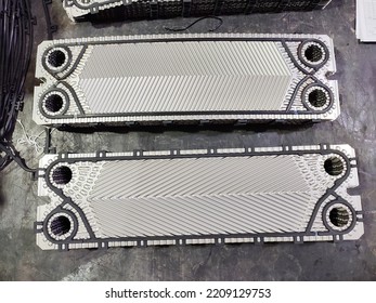 Heat Exchanger Plate Pack Before Assembly Of Plate Heat Exchanger In A Factory.