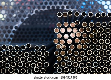 Heat exchanger tube maintenance by replacement of all tubes subjected to wall loss by corrosion.