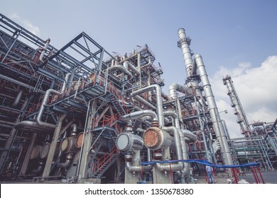 Heat exchangers in a refinery. The equipment for pipe line oil refining.