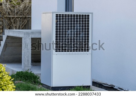 Heat pump from the house in the garden