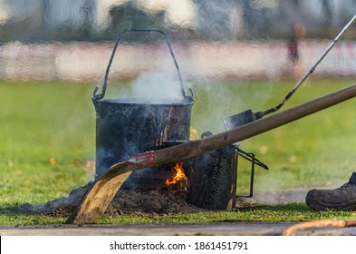 Heat Shimmer And Smoke Over Tar Cooker