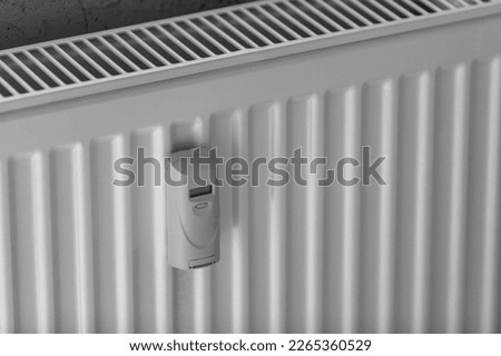 Heat sink installed on a water heating battery