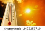 Heat, thermometer shows the temperature is hot in the sky, Summer