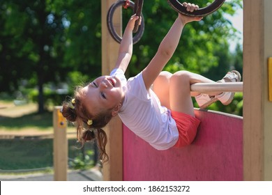 Heat wave concept with girl sweating under the hot sun at playground