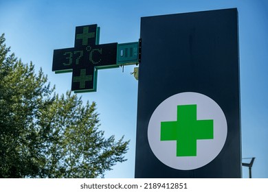 Heat Wave, Heat Wave. Pharmacy Green Cross With Temperature 37°. Normandy, France, August 2022