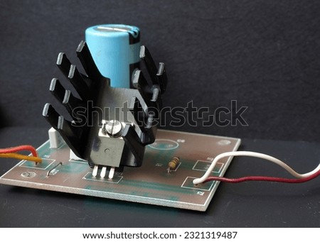 Heated semiconductor component and its heatsink. Thermal conduction in integrated circuits or transistors. 