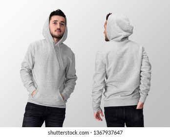 Heather Grey Blank Hoodie On A Young Middle Eastern Man In Jeans, Isolated On A White Studio Background, Front And Back View Mockup Of Heather Grey Hoodie With Place For Your Logo Or Design