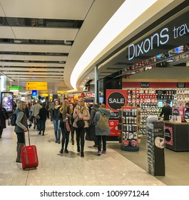 Heathrow Airport, London, England - January 2018: People Outside A Shop In The Duty Free Area