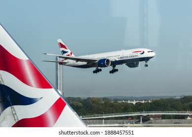 Heathrow, London UK - September 19 2019: British Airways Plane Landing Viewed From The Lounge.