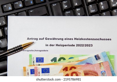 heating allowance, close-up of a German application form allowance for Heizkostenzuschuss in Germany- heating allowance, Money and a ballpoint pen. Emergency Aid Application - Shutterstock ID 2195786981