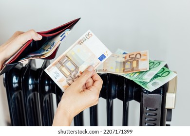 Heating, Energy Crisis In Europe And Consumption Concept. Woman Counting Cash Money For Pay Utility Bills At Home. Rising Costs In Private Households For Gas Bill Due To Inflation And War