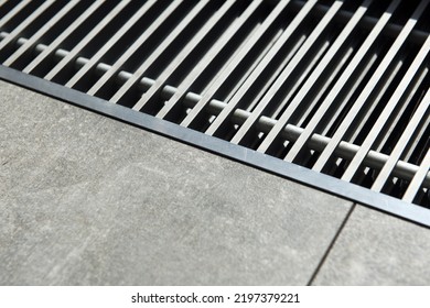 Heating Grill With Ventilation In The Floor In Laminate.. Forced Hot-air Heating Systems Are Extremely Popular And Feature Vents Like This To Channel The Hot Air Throughout The House.