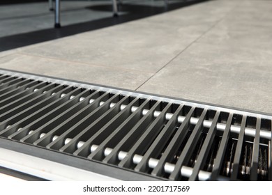 Heating Grill With Ventilation In The Floor In Laminate.. Forced Hot-air Heating Systems Are Extremely Popular And Feature Vents Like This To Channel The Hot Air Throughout The House.