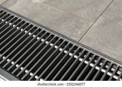 Heating Grill With Ventilation In The Floor In Laminate.. Forced Hot-air Heating Systems Are Extremely Popular And Feature Vents Like This To Channel The Hot Air Throughout The House.