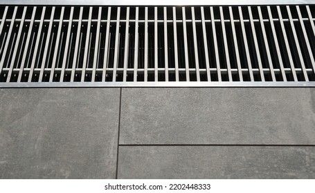 Heating Grill With Ventilation In The Floor In Laminate.. Forced Hot-air Heating Systems Are Extremely Popular And Feature Vents Like This To Channel The Hot Air Throughout The House.